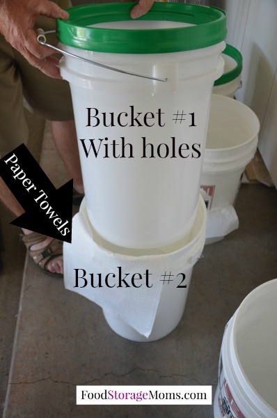 Two Buckets With Paper Towels