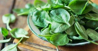 Spinach on a wood board