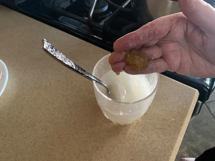 Cold water bowl with semi-firm ball of caramel