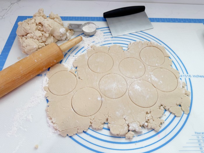 Raisin Cookies Being Cut Out For Baking
