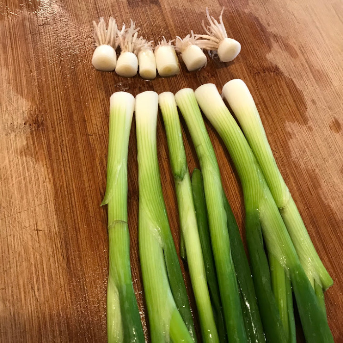 Cutting Green Onions on Board