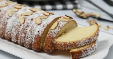 Baked Almond Cake On A White Plate