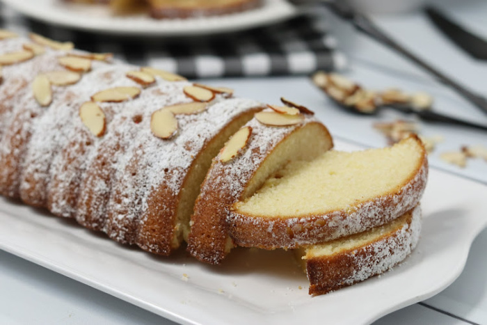 Baked Almond Cake On A White Plate