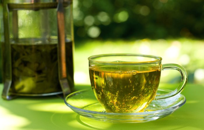 Green Tea Steeping in a cup ready to drink