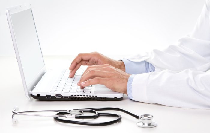 Coronavirus-Doctor sitting at a desk