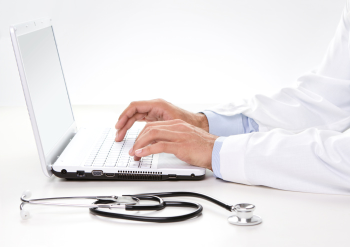 Coronavirus-Doctor sitting at a desk