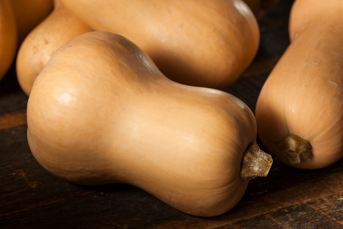 Butternut squash on a wooden board