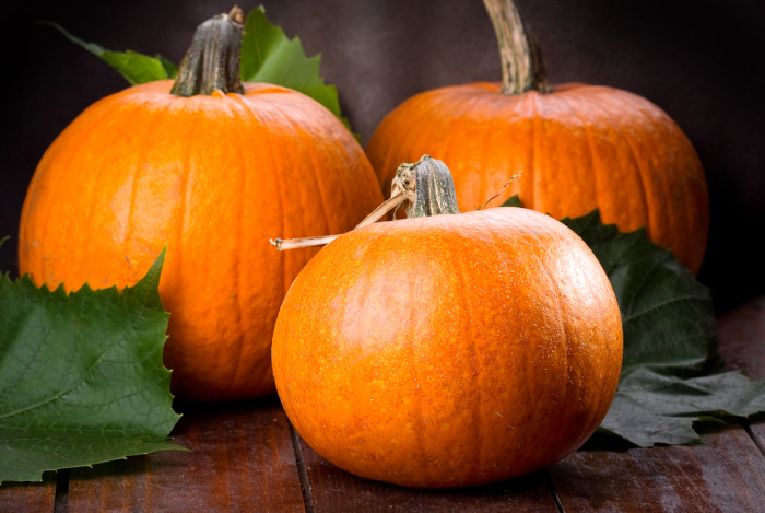 Pumpkins on wooded floor