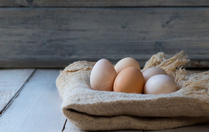 Fresh eggs on muslin