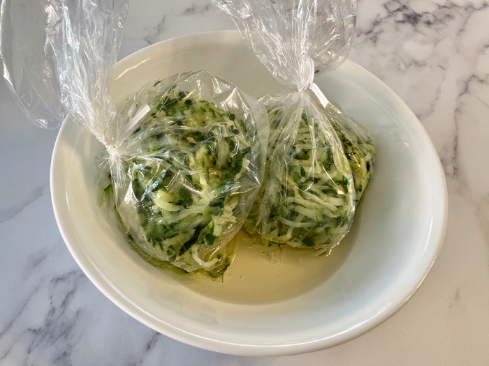 Frozen shredded zucchini in bowl