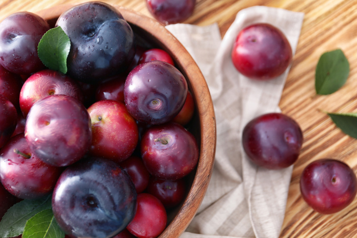 Fresh Plums on a Table