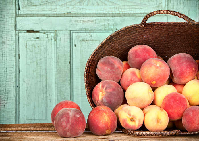 Fresh Peaches in a Basket