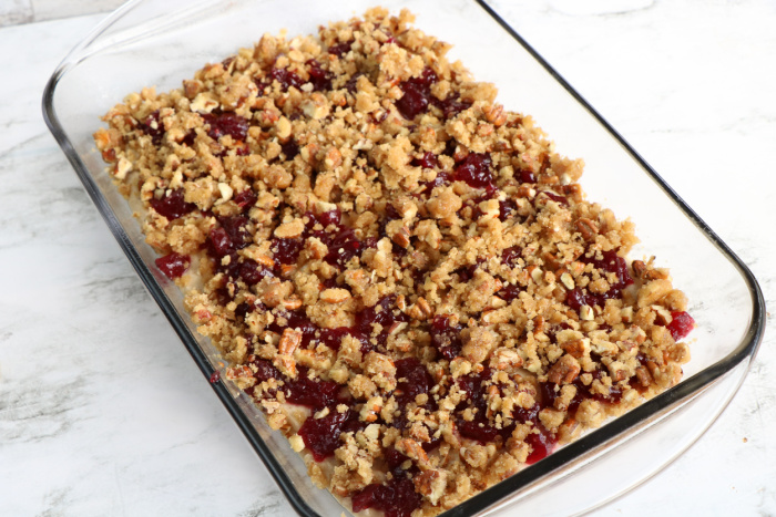 Spread the crumble topping on the batter