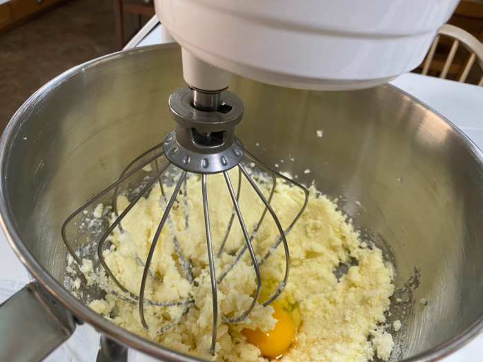 Mixing the sugar and eggs