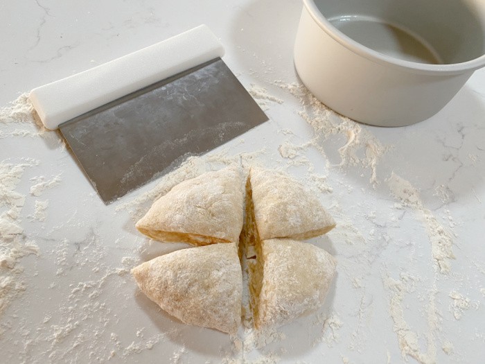 Cut dough into quarters