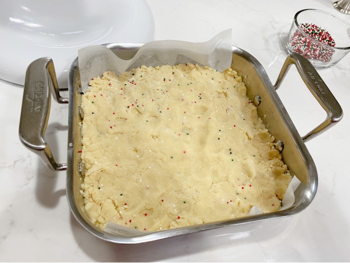 Fold in Sprinkles and pat into prepared pan