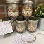 Jars filled with ingredients for 3-bean chili soup