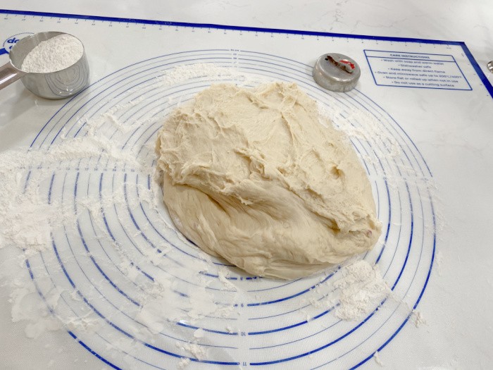 Put dough onto the floured countertop