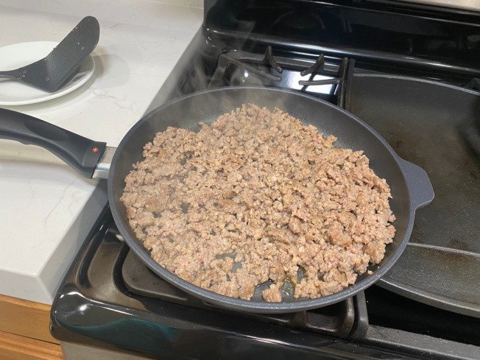 Frying the ground beef