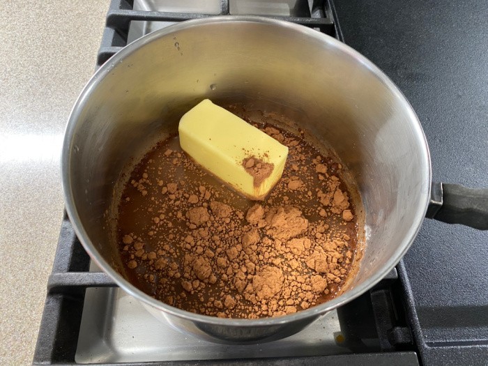 Boil the butter, water and cocoa