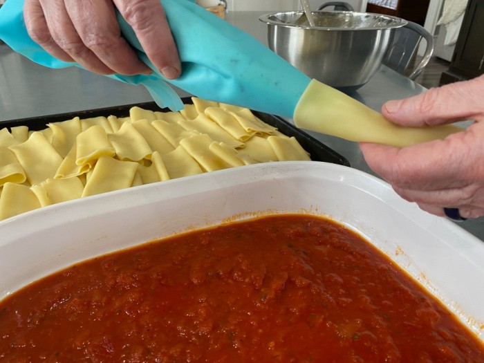 Filling Manicotti