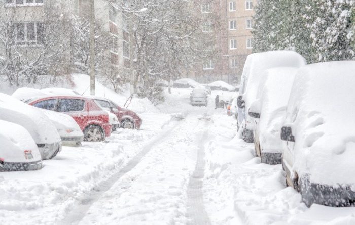 Snow Covered Cars and Roads