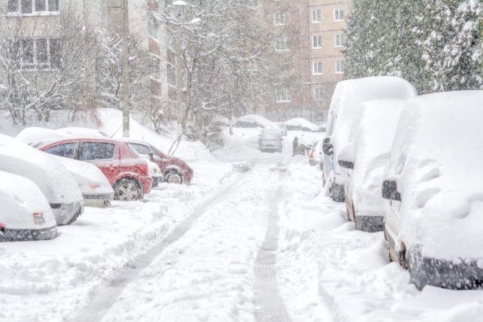 Snow Covered Cars and Roads