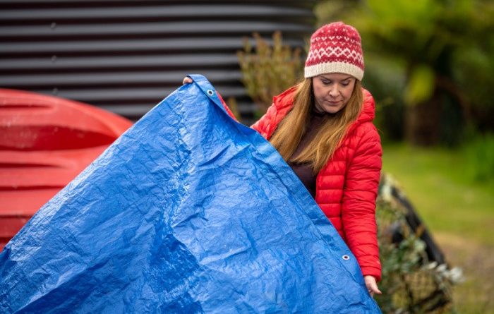 Lady with Blue Tarp