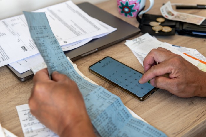 Person Using A Calculator