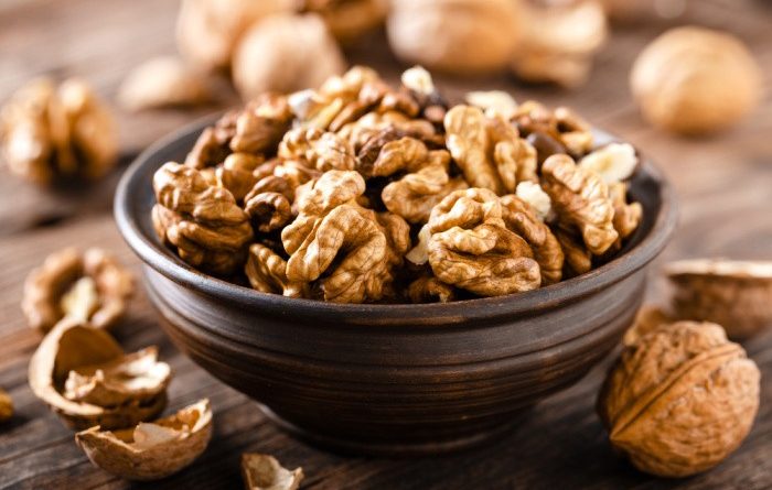 Walnuts on Wooden Rustic Board