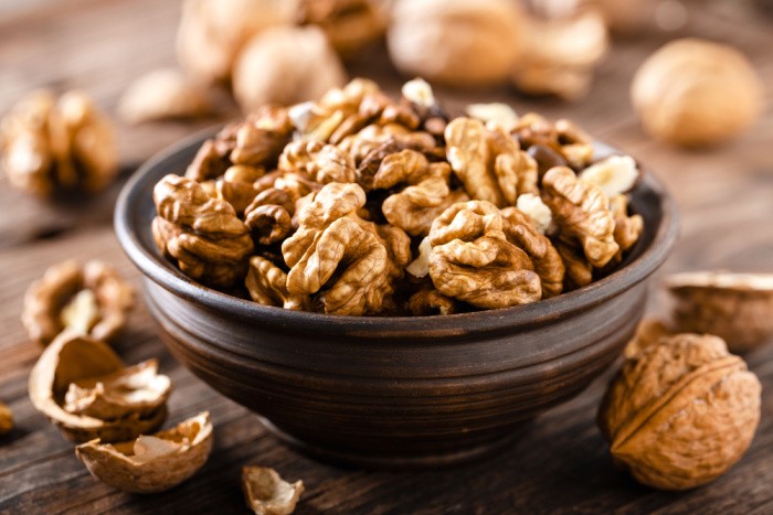 Walnuts on Wooden Rustic Board