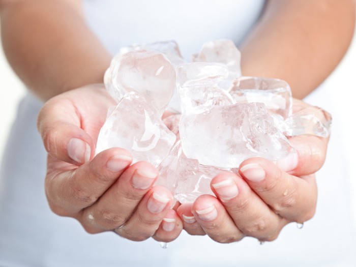 Ice Cubes In Hands