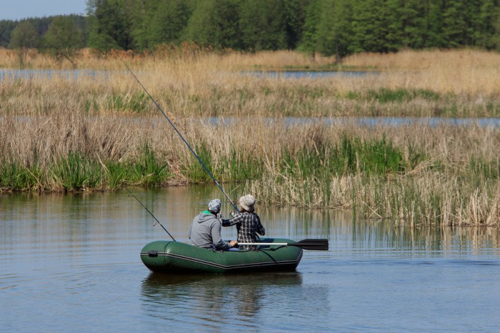 Fishing Together In Boat