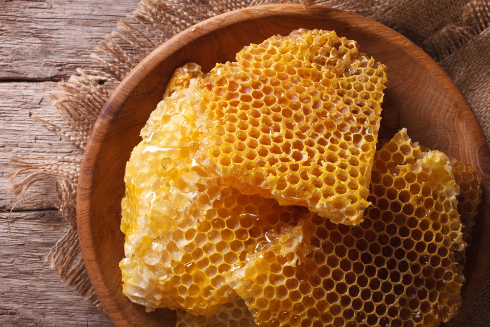 Honeycombs on Wooden Plate